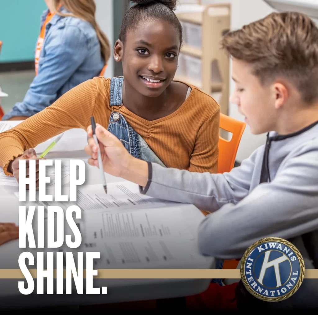 Children learning together with the message: Help kids shine.